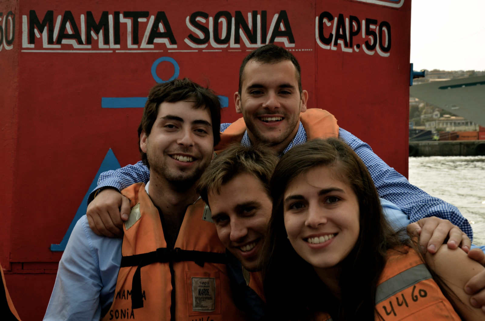 Students (l.-r.) Leonardo Fernandez (ILA 14), Matias Hartmann (ILA 14), Martin Pustavrh (ILA 14) and Desire Siguado (ILA 14) take a sightseeing boat ride at the industrial port city of Valparaiso, after a tour of the Chilean congress. 
