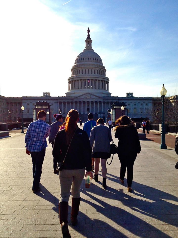 Capital Semester students walk by the U.S. Capitol Building, only blocks away from their housing for the semester.