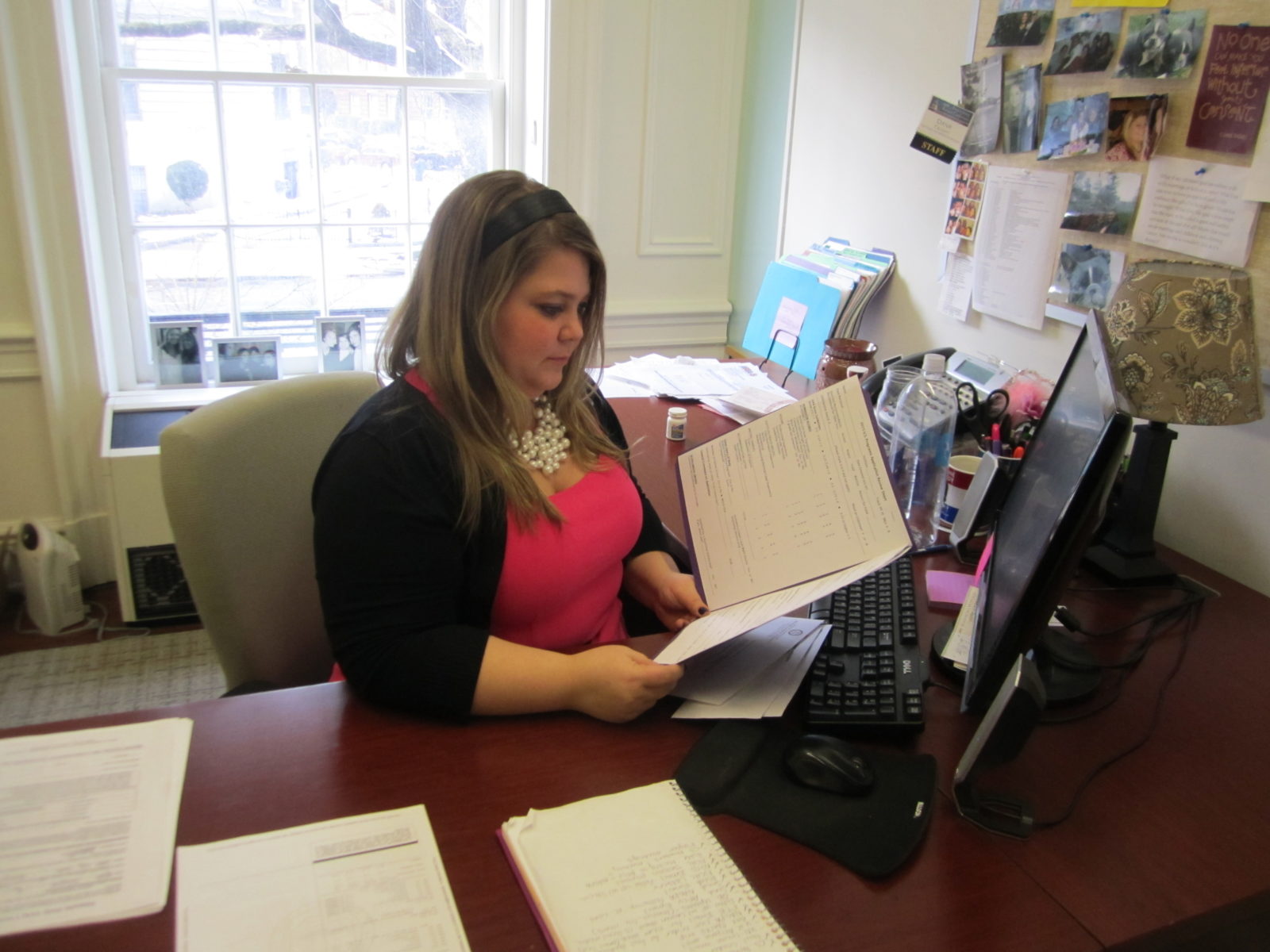 Dana Faught, associate director of U.S. programs recruitment and admissions, reviews an application for the Capital Semester Fall 2015 program.