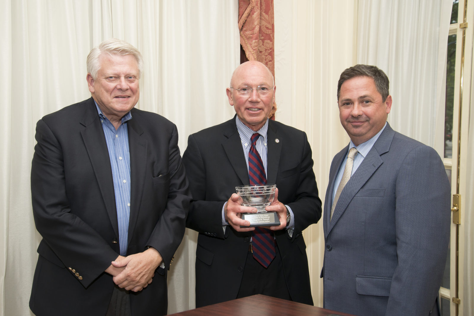 Dr. Eugene Tempel accepts the 2014 David R. Jones Leadership in Philanthropy Award from TFAS