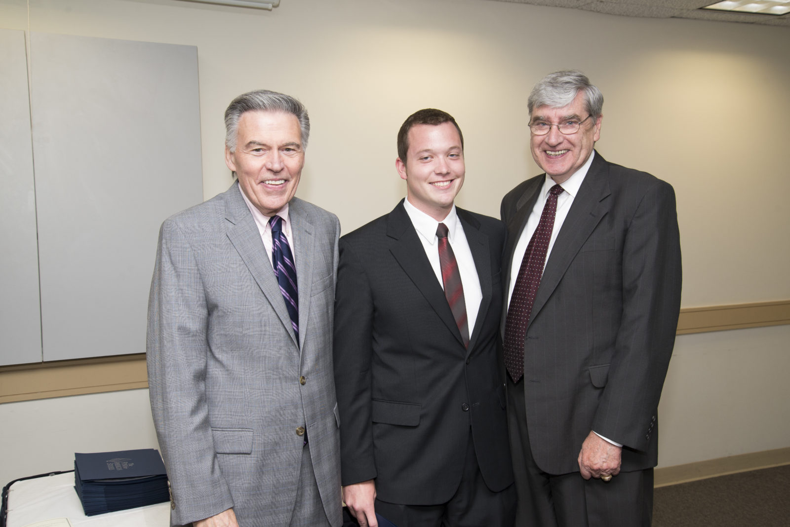 Professor Doherty (right) takes a post TFAS graduation photo in 2013 with his co-teacher Professor Collins (left) and then-student Joel Troutman (IBGA 13).