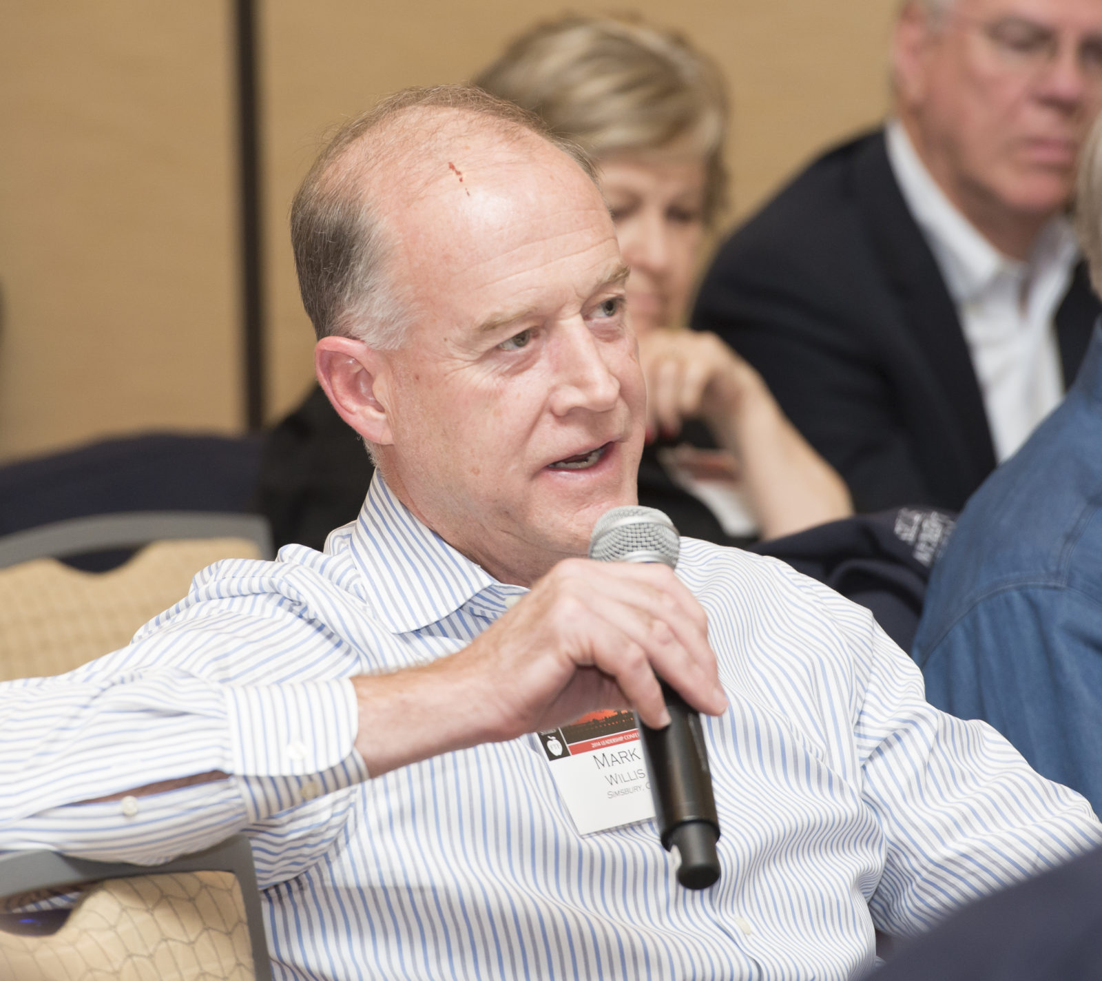 Mark asks a question during a TFAS alumni led panel on "Lessons and Insights of Election 2014" in Naples, Florida.