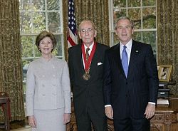 Berns (center) meets with President George W. Bush and Laura Bush in the Oval Office after receiving the 2005 National Humanities Medal.