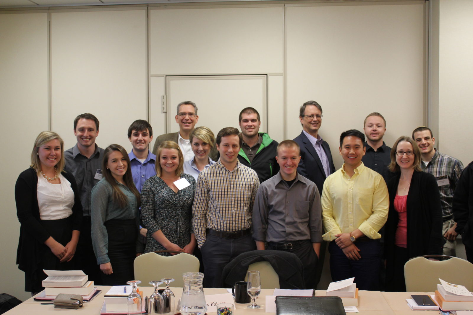 Seminar participants and Professors Birzer and Morriss pause for a group photo after their last session. 
