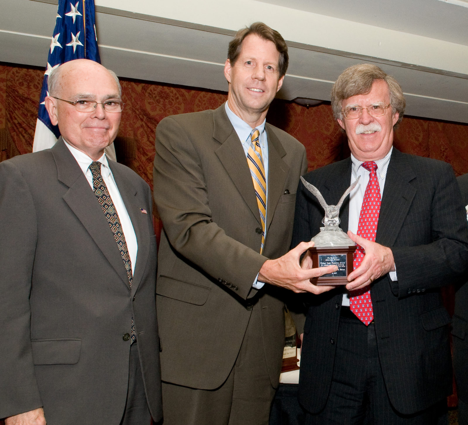 (r.) Former U.S. Ambassador to the United Nations John Bolton was given the 2009 Walter Judd Freedom Award on July 23. He is pictured here with (l.-r.) 2008 recipient Dr. Lee Edwards and TFAS President Roger Ream.
