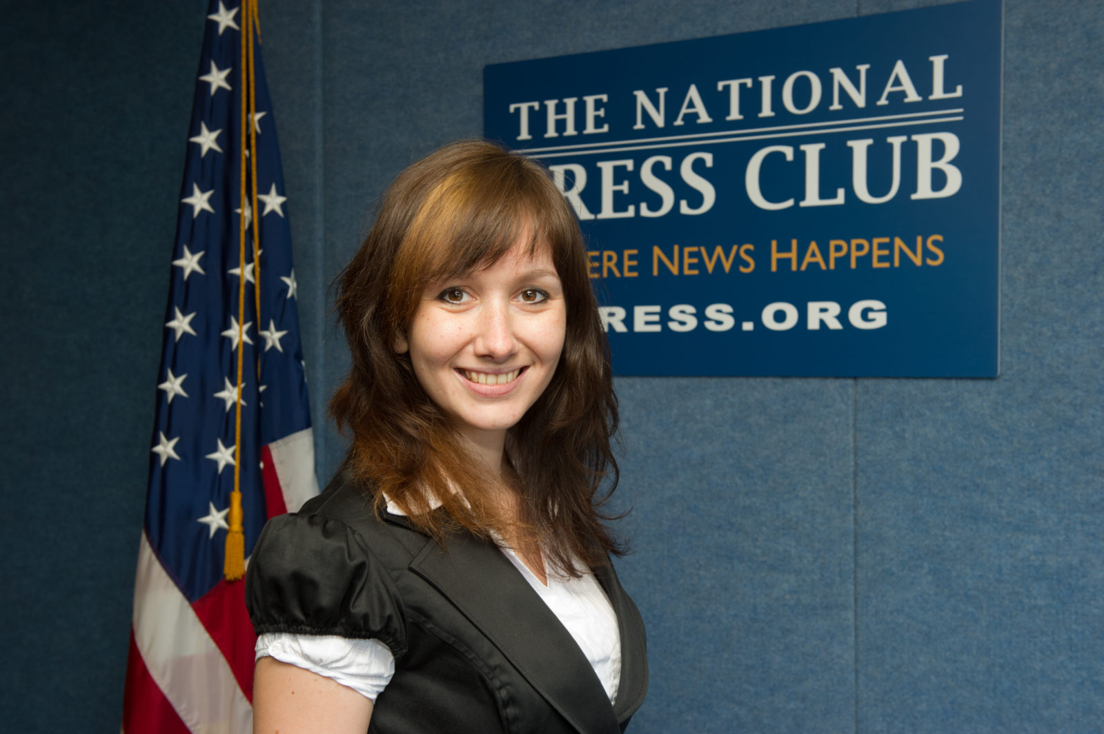 2011 IPJ student Katerina Mestanova takes in the atmosphere of the Press Club during the reception.