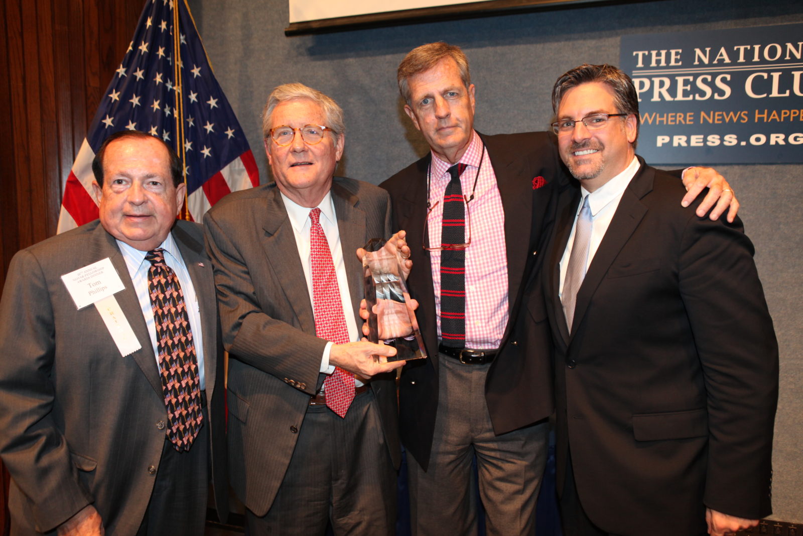 Thomas L. Phillips, Brit Hume and Stephen Hayes present TFAS Trustee Fred Barnes with the Thomas L. Phillips Lifetime Achievement Award. 