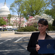 Besa Rizvanolli (A 08, CSS 09)displays her graduation certificate after completing Capital Semester Spring in 2009. 