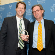 TFAS President Roger Ream (ICPES 76) awards Ronald Hart (ICPES 81) with the 2011 Kevin Burket Alumni Service Award. Hart is one of five new appointees on TFAS leadership boards.