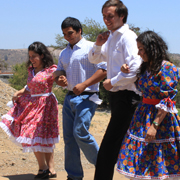 Chilean students Constanza Egana, Stefano Bacigalupo, Dirk Mengers and Angelica Abarca perform the 'cueca,' a traditional Chilean dance, at the ILA cultural presentations.