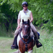 Smith enjoys horseback riding and trail-trial competitions in her down time. She is shown here with her horse Buddy.