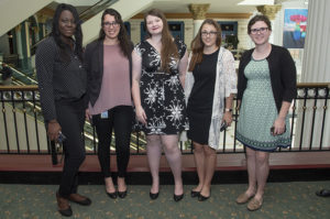 Five young women stand together for a photo at the 2018 TFAS Mentor Breakfast.